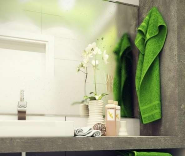 Яркие полотенца - удачное дополнение для интерьера ванной комнаты в светлых тонах