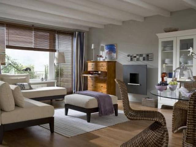Электрический камин является оптимальным вариантом для гостиных в стандартных квартирах